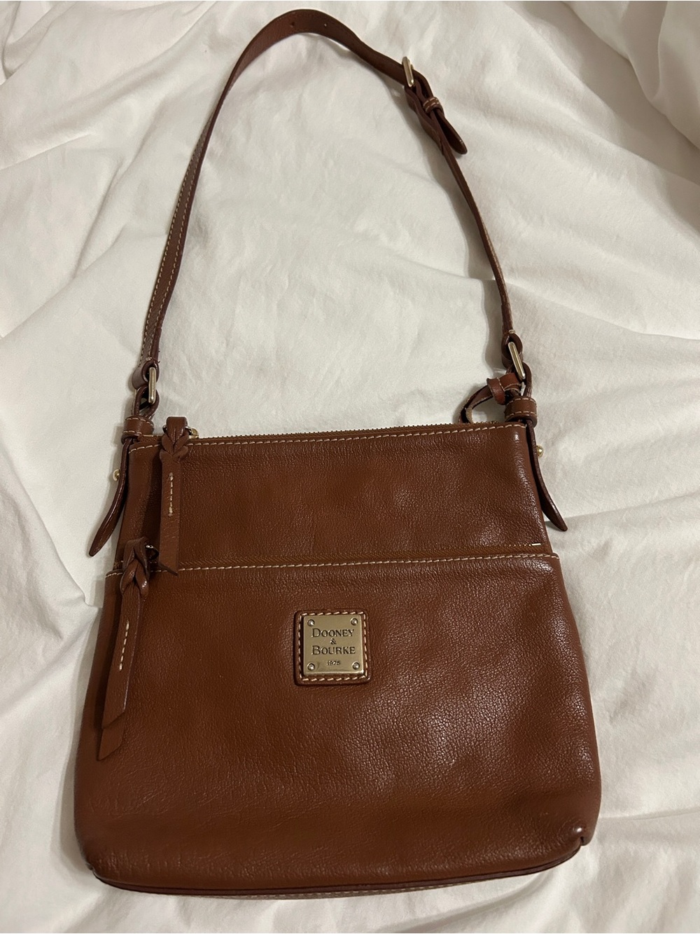 Dooney & Bourke Brown Pebble Leather Crossbody Style with Logo Plaque